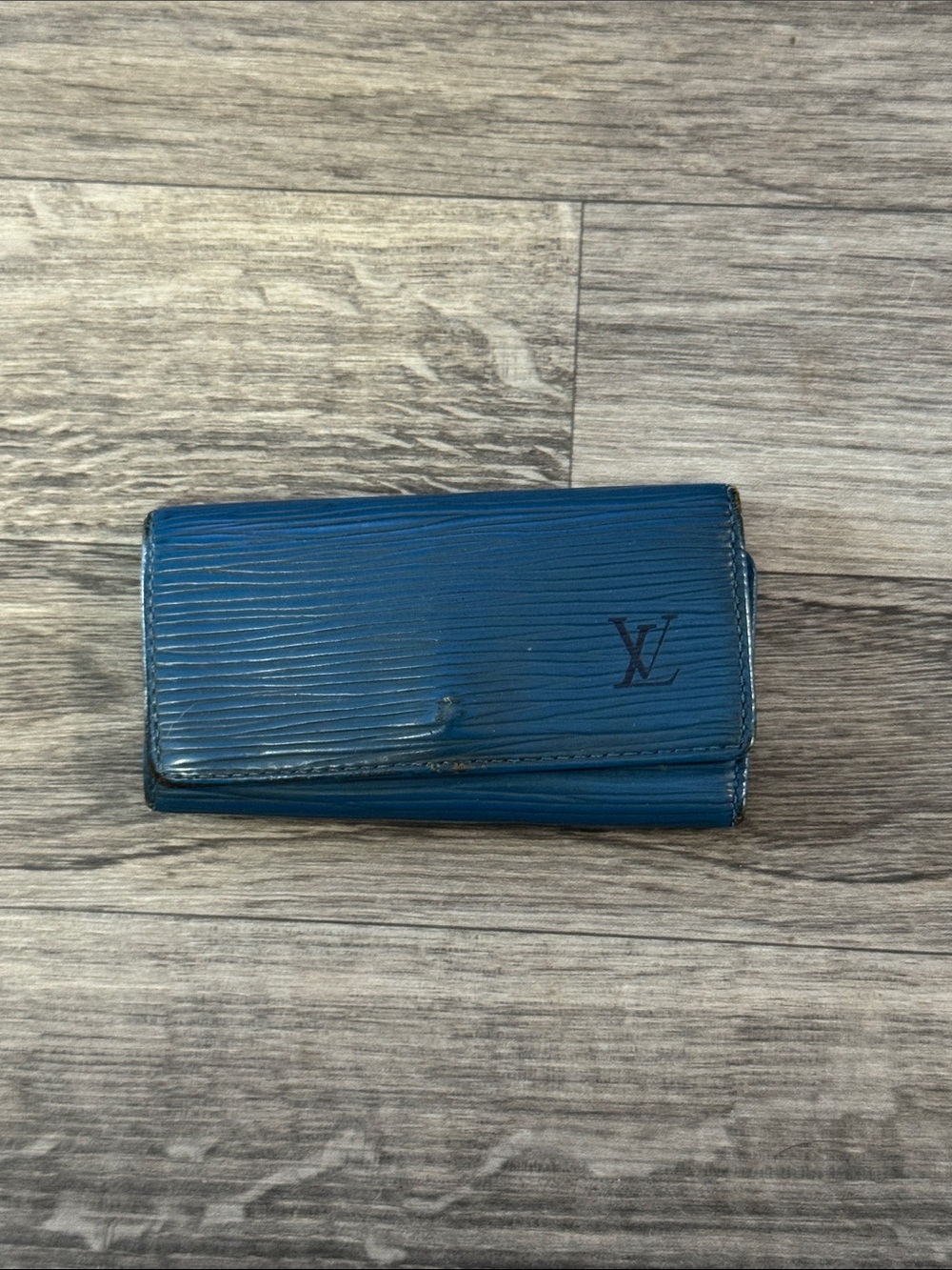 Vintage Louis Vuitton blue epi 4 key holder